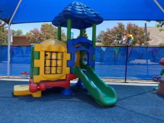 Slides, toys, shade, soft turf